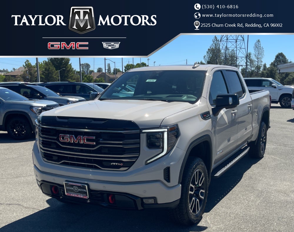 2026 GMC Sierra 1500 AT4 in Coastal Dune — front three-quarter view